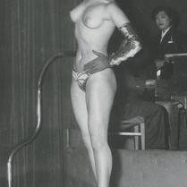 A topless Korean female dan...