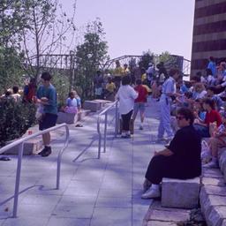Visitors sitting on terrace...