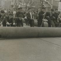 A group of students are rol...