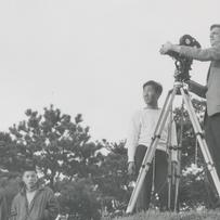Ted Conant adjusting the se...