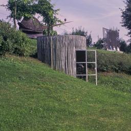 Sculpture in field.