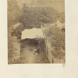 Thomas Carlyle Seated under...