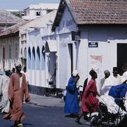 Men walking, entering Mosqu...