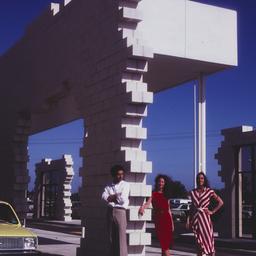 Man and two women posing wi...