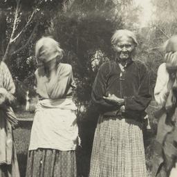 Four Elderly Women Standing...