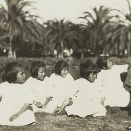 Two Women with a Group of E...