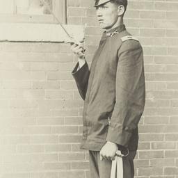 Young Man in Uniform Saluti...