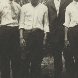 Four Men Posing for the Camera