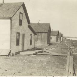 Ojibwa Houses near a Lake, ...