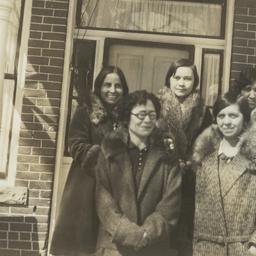 Five Women in Coats Posing ...
