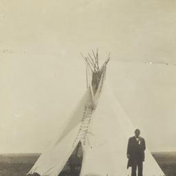Man in Formal Attire Standi...