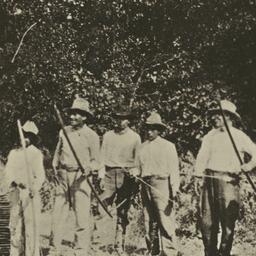 Group of Men Lined up with ...
