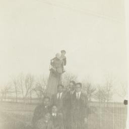 Group of Men Outside Gather...