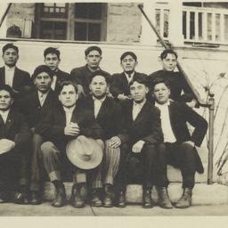 Group of Young Men Sitting ...