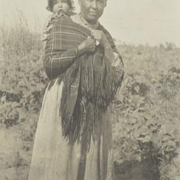 Native American Woman Carry...