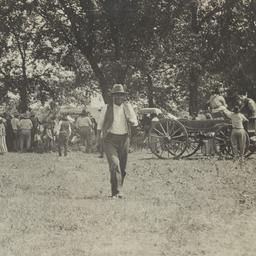 Man Walking toward the Came...