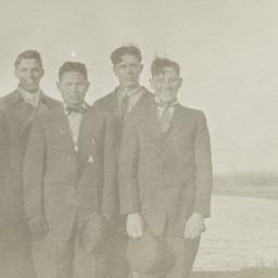 Five Men Wearing Suits and ...