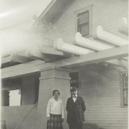 Man and Woman Posing in fro...