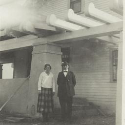 Man and Woman Posing in fro...