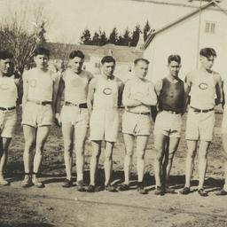 Line of Young Men in Shorts...