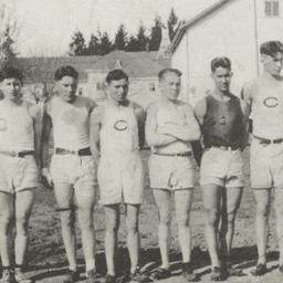 Line of Young Men in Shorts...