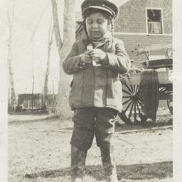 Young Child with Braided Ha...