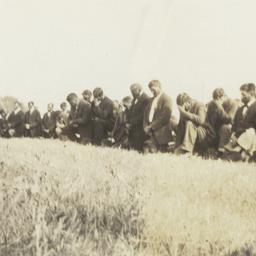 People Bowed in Prayer