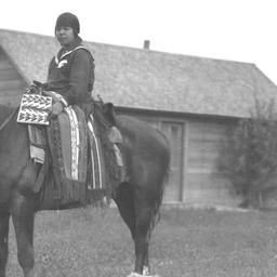 Cayuse on Horseback