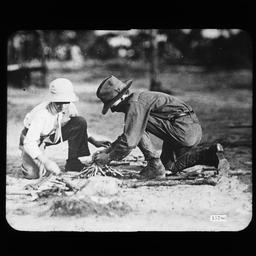 Two Young Boys Building Kin...