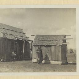 Two Buildings with People i...