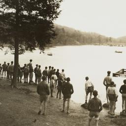 Boys Canoeing with Spectato...