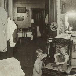 Two Children in Tenement Rooms