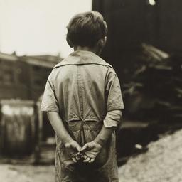 Boy With Hands Behind his Back