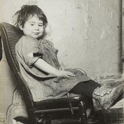 Little Girl in Rocking Chair