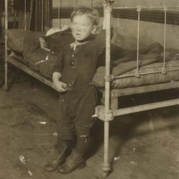 Little Boy near Bed