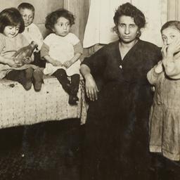 Woman with Four Children ne...