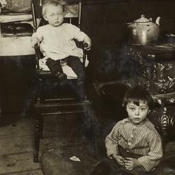 Baby in High Chair and Chil...