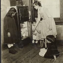 Children Around Icebox