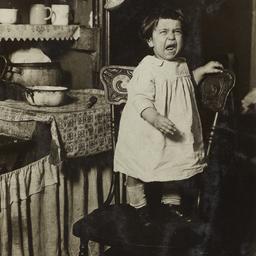 Child Crying on Chair