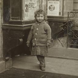 Two Children near Grate