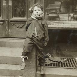 Boy Sitting on Stoop