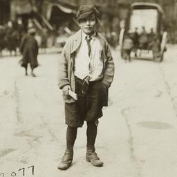Boy Holding Wood Scrap