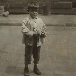 Boy Alone on Street