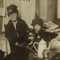 Child with Cat and Two Women