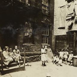 Children Between Buildings