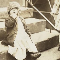 Girl in Hat on Stairs