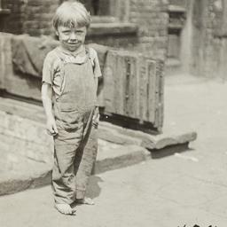 Barefoot Boy on Sidewalk