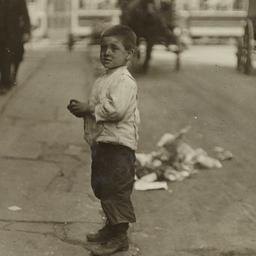 Boy on Curb near Horse Draw...