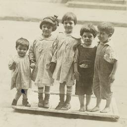 Children Standing on Frame