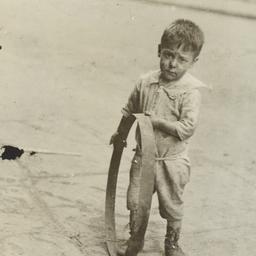 Boy with Metal Circle